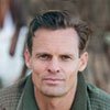 man wearing green jacket avatar.jpg